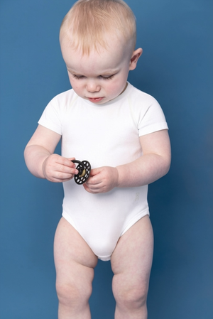 White Flexisuit bodysuit from Flexisuit, shown in a sleek, fitted design on a mannequin.